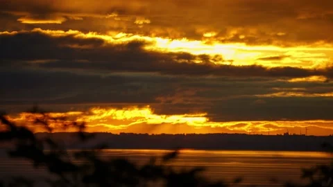 Sunset with partial solar eclipse Stock Footage 193826570