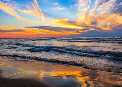 Sunset partly cloudy Stock Photos