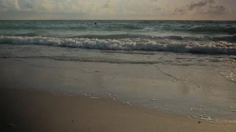 Sunset at Pass-a-grille Beach in St Petersburg Florida. Low light with multiple Stock Footage 276675886