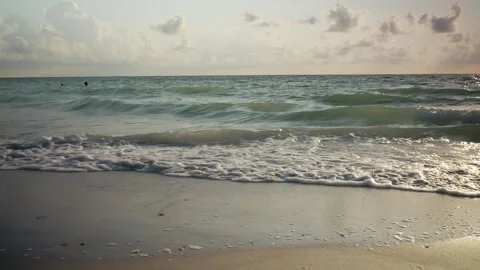 Sunset at Pass-a-grille Beach in St Petersburg Florida. Low light with multiple Stock Footage 276675887