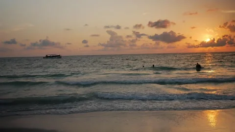 Sunset at Pass-a-grille Beach in St Petersburg Florida. Low light with multiple Stock Footage 276676504