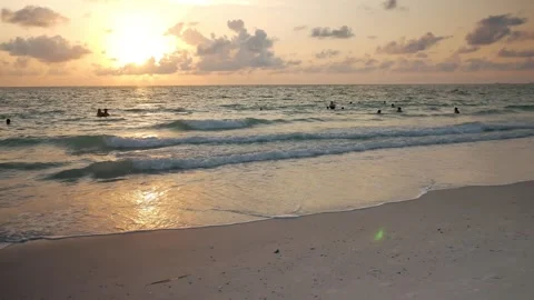 Sunset at Pass-a-grille Beach in St Petersburg Florida. Low light with multiple Stock Footage 276676510