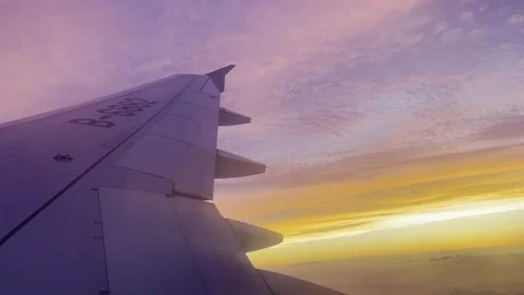 Sunset from the passenger aircraft window 3 b Vídeos de archivo 341270028