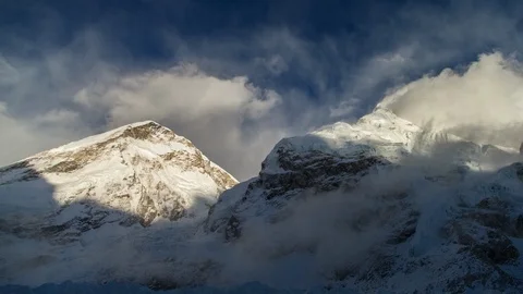 Sunset with passing clouds over the Khumbu Icefall Stock-Footage 122115821
