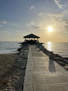 Sunset Pavilion by the Sea Foto stock