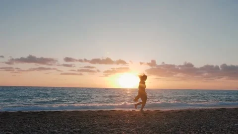 Sunset On Pebble Beach Background Video stock 169692405