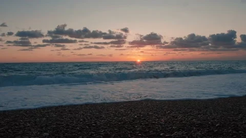 Sunset On Pebble Beach Background Stock Footage 169864725