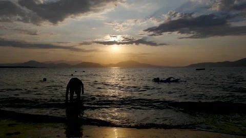 Sunset on a pebble beach in Pefki, Greece. Stock Footage 265173811