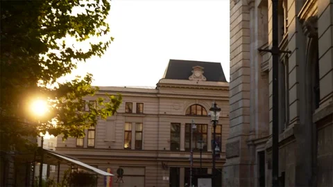 Sunset peeking through old town of Romania Stock Footage 272693589