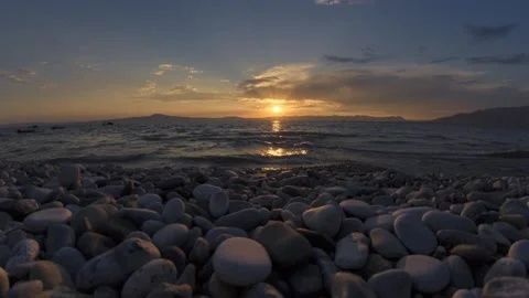 Sunset in Peleponnes with Stone Beach Timelapse Stock Footage 147528642