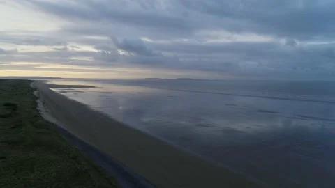 Sunset at Pendine Sands Cloudy Evening Beach Aerial Drone Shot 2 Stock Footage 172576988