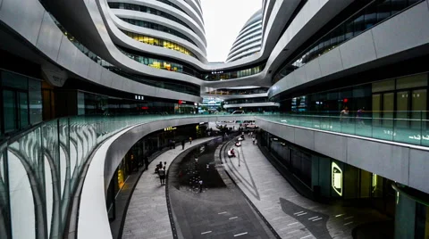 At sunset people have fun in Galaxy SOHO shopping center in Beijing, China Stockbeeldmateriaal 41678574