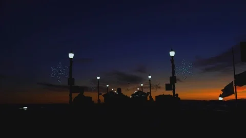 Sunset at the pier with lights, 4K Stock Footage 101002471