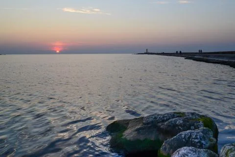 Sunset at a pier Stock Photos