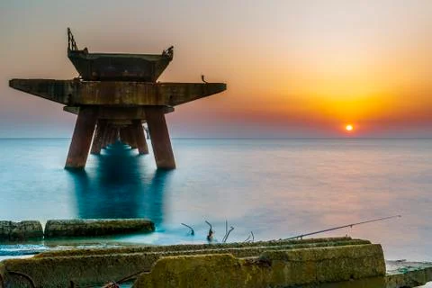 Sunset on pier Stock Photos