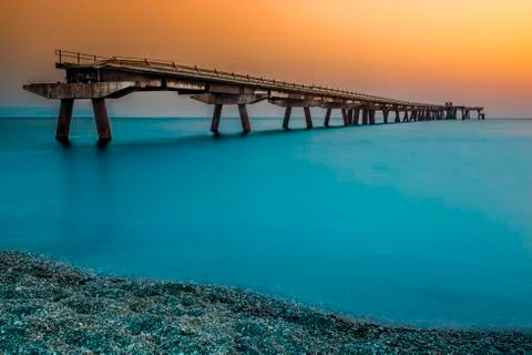 Sunset on pier Stock Photos