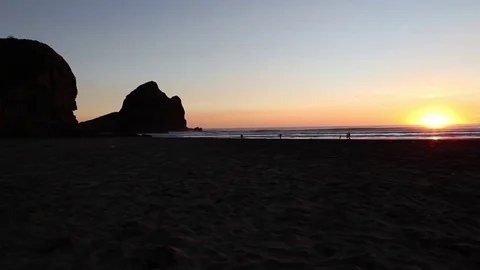Sunset on Piha Beach Stock Footage 76688155