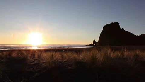 Sunset on Piha Beach Stock Footage 76688655