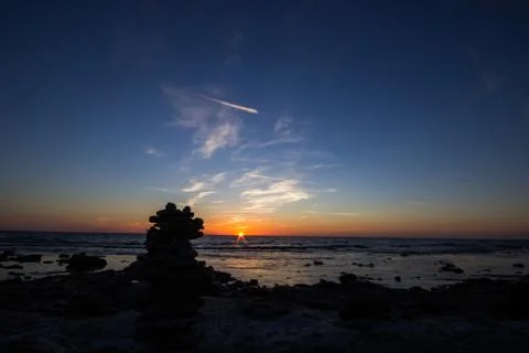 Sunset with Pile of Rocks Stock Photos