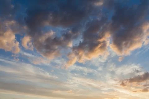 Sunset pink cloudscape clouds with blue sky background Stock Photos