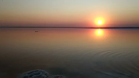 Sunset on pink lake in Ukraine. Stock Footage 98082102