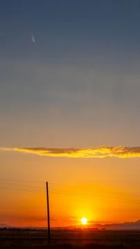 Sunset with plane and open sky, ideal for text overlays and vertical wallpa.. Stock Photos