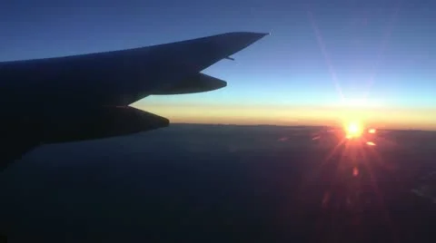 Sunset from plane window Stock Footage 10810041