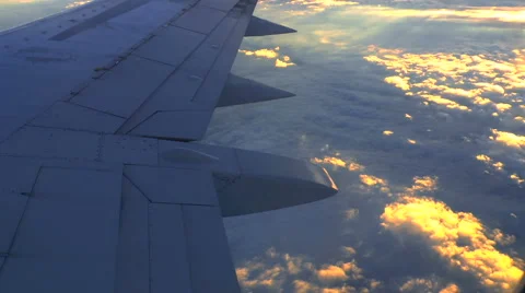 Sunset from the plane window Stock Footage 67415272