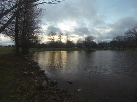 Sunset pond Stock Photos