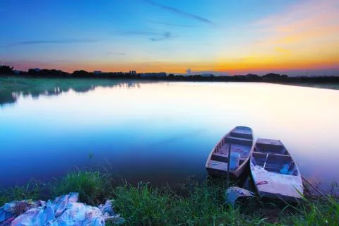 Sunset at pond Stock Photos