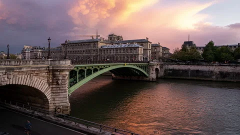 Sunset at Pont Notre Dame Bridge in Paris Stock Footage 328829374