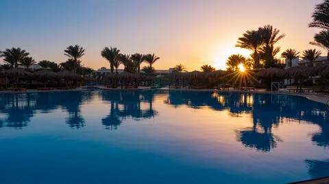 Sunset by the pool Foto stock