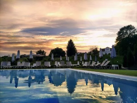 Sunset by the pool Foto stock
