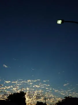 Sunset Popcorn Clouds Streetlight Stock Photos