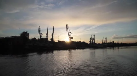 The sunset. Port cranes. Stock Footage 52933209