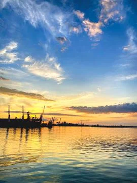 Sunset at the port Stock Photos