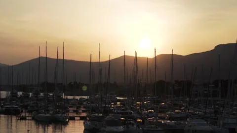 Sunset in the port with sailing yachts Stock Footage 183464506
