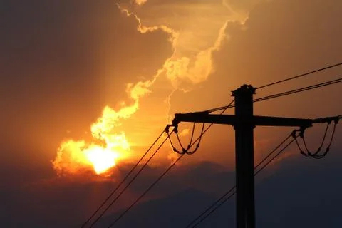 Sunset on powerlines Stock Photos