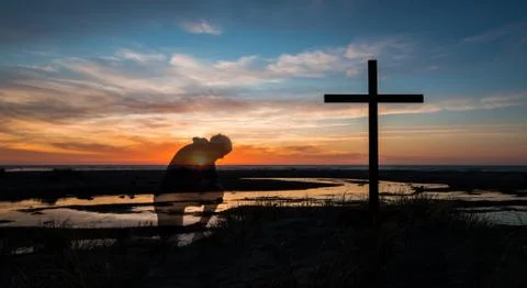 Sunset Prayers By Cross Stock Photos
