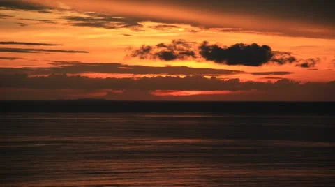 Sunset in Puerto Vallarta. Clouds move quickly in this time lapsed video. Stock Footage 12030321
