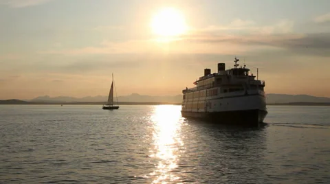 SUNSET ON PUGET BAY, FERRY AND SAILBOATS IN SHOT Stock Footage 32151786