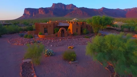 Sunset pull back Superstition mountain home AZ.mp4 Stock Footage 54257896