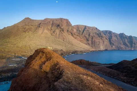 Sunset at Punta de Tena rocks Stock Photos