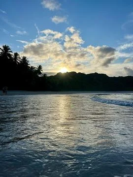 Sunset on the quiet beach Stock Photos