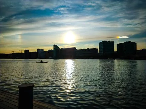 Sunset with rainbow sky reflections Stock Photos