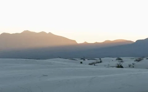 Sunset Rays cross over White Sands Stock Photos