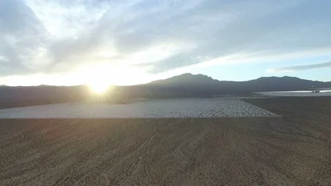 Sunset rays over vast Solar electric plant in the Mojave Desert Stock Footage 99314357