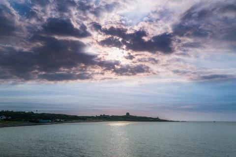 Sunset Rays Piercing Clouds over Shimen Coast Seascape, New Taipei City Taiwan. Stock Photos