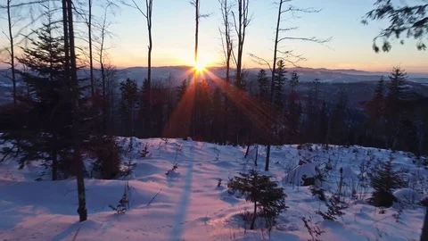 Sunset Rays Winter Reverse Aerial 4k Stock Footage 70885616