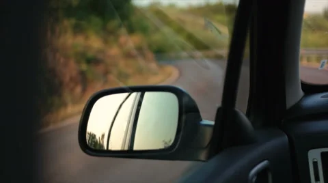 Sunset in rearview mirror Stock Footage 52686504